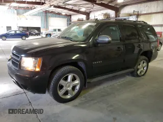 2013 Chevrolet Tahoe LT with VIN 1GNSKBE01DR288157, listed as a Copart auction lot 52665075 with 152,068 mi miles and Salvage Title. Bid and sale history available at DreamBid. Image 1.