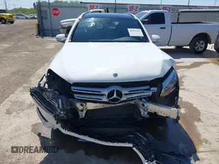 2018 Mercedes-Benz GLC 300 with VIN WDC0G4JB9JV056407, listed as a IAAI auction lot 41965217 with 77,228 mi miles and . Bid and sale history available at DreamBid. Image 13.