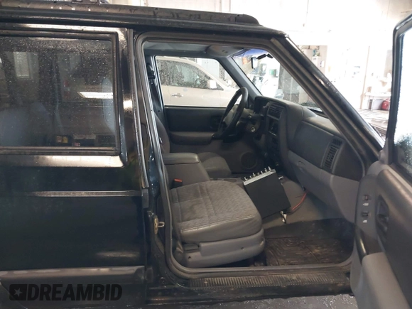 1998 Jeep Cherokee Sport with VIN 1J4FJ68SXWL281659, listed as a IAAI auction lot 42208563 with 203,992 mi miles and . Bid and sale history available at DreamBid. Image 5.