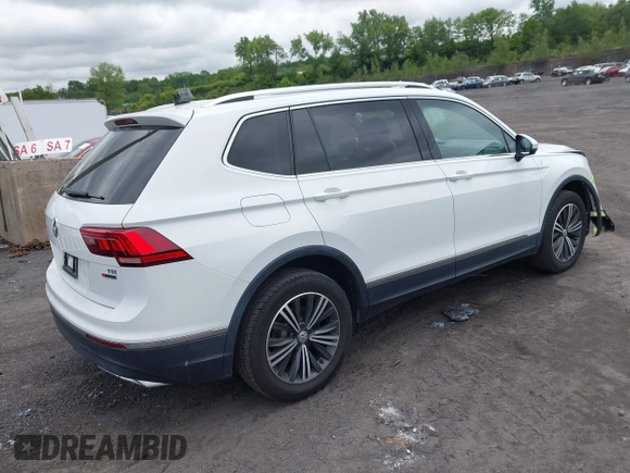 2018 Volkswagen Tiguan SEL with VIN 3VV2B7AX7JM099570, listed as a IAAI auction lot 42374274 with 87,838 mi miles and . Bid and sale history available at DreamBid. Image 4.