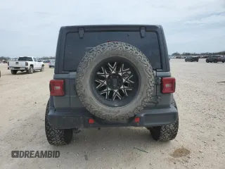 2020 Jeep Wrangler Unlimited Sport Altitude with VIN 1C4HJXDG2LW325430, listed as a Copart auction lot 46953185 with 69,919 mi miles and Salvage title. Bid and sale history available at DreamBid. Image 6.