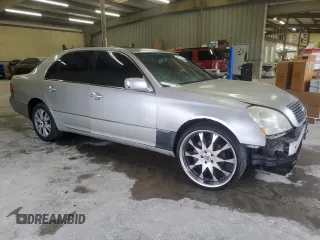 2003 Lexus LS 430 z VIN JTHBN30F530115129, wystawiony jako Copart lot #56521665 z przebiegiem 278 666 mil mil oraz Szkoda całkowita • Salvage title. Historia ofert i sprzedaży dostępna na DreamBid. Obrazek 4.