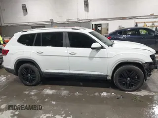 2018 Volkswagen Atlas SEL with VIN 1V2MR2CAXJC557973, listed as a IAAI auction lot 41535114 with 107,894 mi miles and . Bid and sale history available at DreamBid. Image 14.