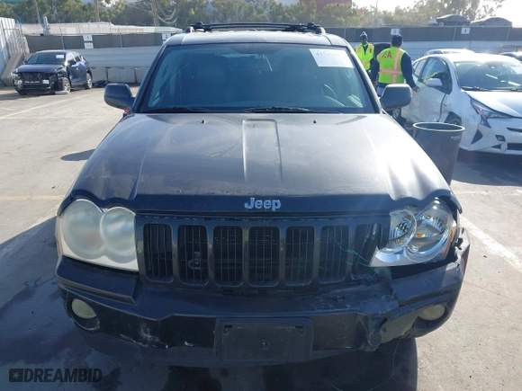2005 Jeep Grand Cherokee Laredo with VIN 1J8GS48K95C615330, listed as a IAAI auction lot 41719101 with 152,186 mi miles. Bid and sale history available at carsss.com. Image 12.