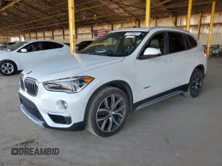 2016 BMW X1 xDrive28i z VIN WBXHT3C35GP881610, wystawiony jako Copart lot #57690625 z przebiegiem 189 579 mil mil oraz Czysty tytuł • Clean title. Historia ofert i sprzedaży dostępna na DreamBid. Obrazek 1.