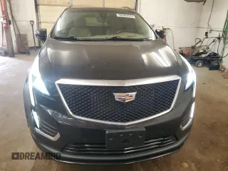 2021 Cadillac XT5 AWD Sport with VIN 1GYKNHRS1MZ103033, listed as a Copart auction lot 58586425 with 65,229 mi miles and Salvage title. Bid and sale history available at DreamBid. Image 5.