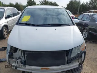 2015 Honda Odyssey EX-L z VIN 5FNRL5H61FB055684, wystawiony jako IAAI lot #42013480 z przebiegiem 221 381 mil mil oraz . Historia ofert i sprzedaży dostępna na DreamBid. Obrazek 13.