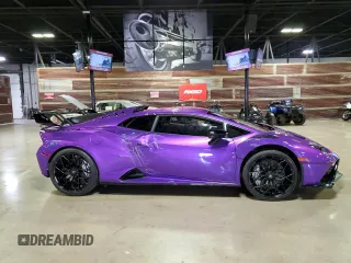 2023 Lamborghini Huracan z VIN ZHWUA6ZX7PLA21724, wystawiony jako Copart lot #78715274 z przebiegiem 1203 mil mil oraz Szkody całkowita. Historia ofert i sprzedaży dostępna na DreamBid. Obrazek 1.
