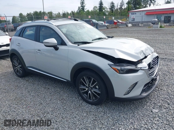 2017 Mazda CX-3 Grand Touring z VIN JM1DKFD70H0159621, wystawiony jako IAAI lot #42331482 z przebiegiem 55 166 mil mil oraz . Historia ofert i sprzedaży dostępna na DreamBid. Obrazek 1.