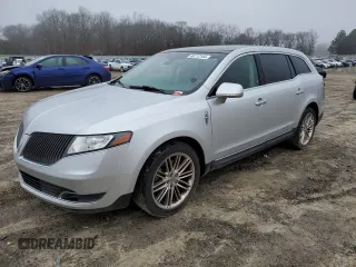 2015 Lincoln MKT EcoBoost with VIN 2LMHJ5AT3FBL03982, listed as a Copart auction lot 86712144 with 179,854 mi miles and Salvage Title. Bid and sale history available at DreamBid. Image 1.