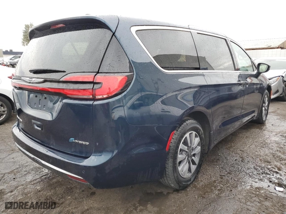 2023 Chrysler Pacifica Hybrid Touring L with VIN 2C4RC1L72PR632382, listed as a Copart auction lot 50989035 with 44,061 mi miles and Salvage Title. Bid and sale history available at carsss.com. Image 3.
