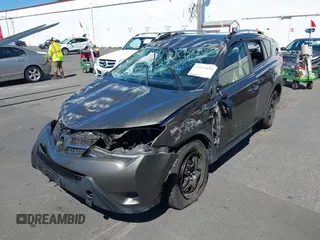 2015 Toyota RAV4 LE with VIN JTMBFREV2FD124756, listed as a IAAI auction lot 42051691 with 92,699 mi miles and . Bid and sale history available at DreamBid. Image 6.