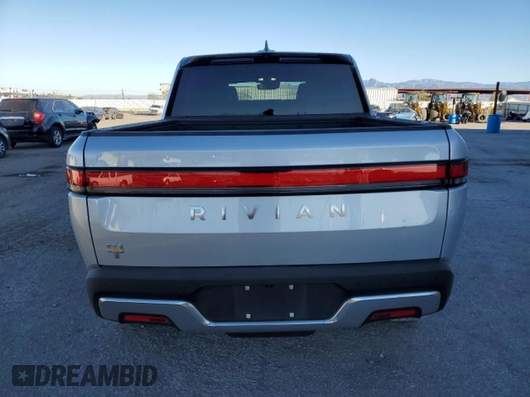 2023 Rivian R1T Adventure with VIN 7FCTGAAA7PN017844, listed as a Copart auction lot 44261105 with 4,590 mi miles and Clean Title. Bid and sale history available at carsss.com. Image 6.