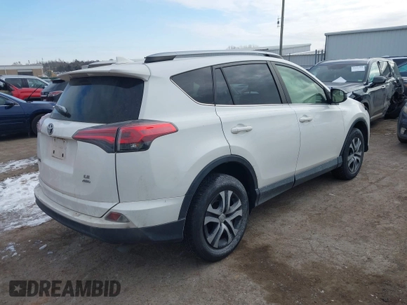 2017 Toyota RAV4 LE with VIN JTMBFREV4HJ170495, listed as a IAAI auction lot 41619488 with 132,751 mi miles and . Bid and sale history available at DreamBid. Image 4.