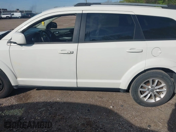 2017 Dodge Journey SXT z VIN 3C4PDCBG9HT589904, wystawiony jako IAAI lot #42084994 z przebiegiem 130 194 mil mil oraz . Historia ofert i sprzedaży dostępna na DreamBid. Obrazek 14.