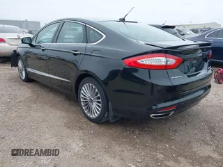 2014 Ford Fusion Titanium with VIN 3FA6P0K9XER364392, listed as a IAAI auction lot 41642439 with 130,302 mi miles and . Bid and sale history available at DreamBid. Image 3.