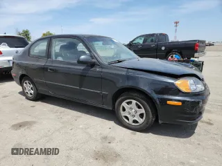 2003 Hyundai Accent GL z VIN KMHCG35C33U258812, wystawiony jako Copart lot #57509245 z przebiegiem 153 716 mil mil oraz Szkoda całkowita • Salvage title. Historia ofert i sprzedaży dostępna na DreamBid. Obrazek 4.