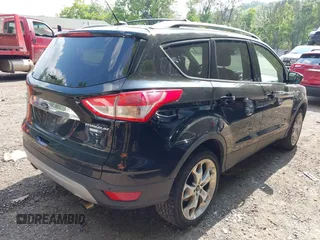 2016 Ford Escape Titanium with VIN 1FMCU9JX1GUC18335, listed as a IAAI auction lot 42396492 with 147,522 mi miles and . Bid and sale history available at DreamBid. Image 4.