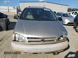 2000 Toyota Sienna LE with VIN 4T3ZF13C4YU304036, listed as a Copart auction lot 72448274 with 176,388 mi miles and Salvage Title. Bid and sale history available at carsss.com. Image 5.
