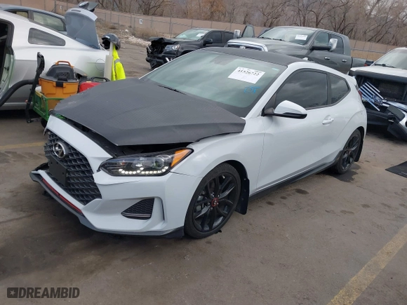 2019 Hyundai Veloster Turbo with VIN KMHTH6AB3KU020193, listed as a IAAI auction lot 41526722 with 54,697 mi miles. Bid and sale history available at carsss.com. Image 2.