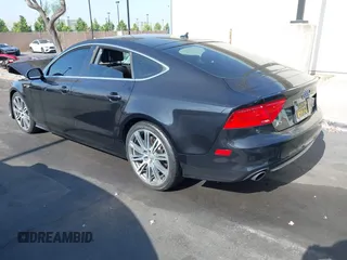2014 Audi A7 Prestige with VIN WAU2GAFC5EN012583, listed as a IAAI auction lot 42561824 with Not provided miles and . Bid and sale history available at DreamBid. Image 3.