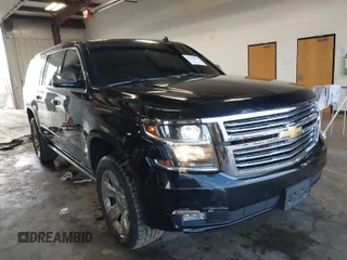 2015 Chevrolet Suburban LTZ with VIN 1GNSKKKC2FR115572, listed as a IAAI auction lot 41959541 with 120,123 mi miles. Bid and sale history available at carsss.com. Image 1.
