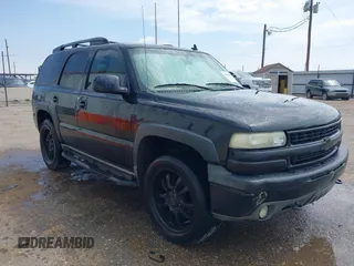 2006 Chevrolet Tahoe LT z VIN 1GNEC13Z96R154005, wystawiony jako IAAI lot #42398314 z przebiegiem 321 965 mil mil oraz . Historia ofert i sprzedaży dostępna na DreamBid. Obrazek 1.