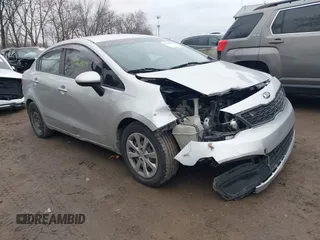 2015 Kia Rio LX with VIN KNADM4A39F6452036, listed as a IAAI auction lot 41516879 with 95,775 mi miles. Bid and sale history available at carsss.com. Image 1.