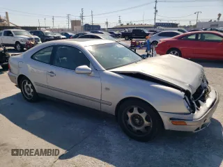 1999 Mercedes-Benz CLK 320/430 with VIN WDBLJ65G9XF065356, listed as a Copart auction lot 73586424 with 228,410 mi miles and Salvage Title. Bid and sale history available at DreamBid. Image 4.