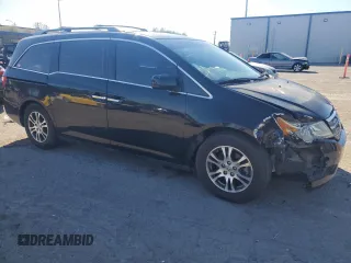2012 Honda Odyssey EX-L with VIN 5FNRL5H64CB052869, listed as a Copart auction lot 47685375 with 168,449 mi miles and Salvage Title. Bid and sale history available at DreamBid. Image 4.