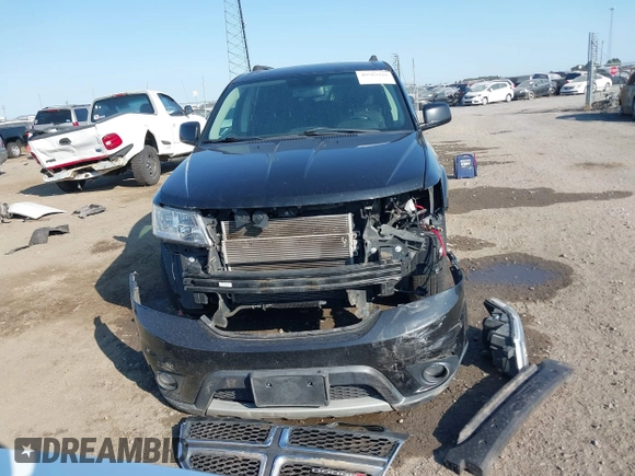2013 Dodge Journey SXT with VIN 3C4PDCBG7DT710844, listed as a IAAI auction lot 40582910 with 136,741 mi miles and . Bid and sale history available at DreamBid. Image 12.