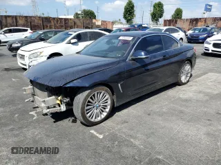 2014 BMW 4 Series 428i with VIN WBA3V7C55EP771290, listed as a Copart auction lot 71844444 with 83,710 mi miles and Salvage Title. Bid and sale history available at DreamBid. Image 1.