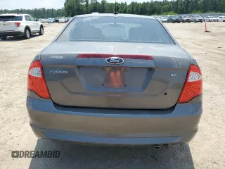 2012 Ford Fusion SE z VIN 3FAHP0HA0CR328833, wystawiony jako Copart lot #57631955 z przebiegiem 94 613 mil mil oraz Szkoda całkowita • Salvage title. Historia ofert i sprzedaży dostępna na DreamBid. Obrazek 6.