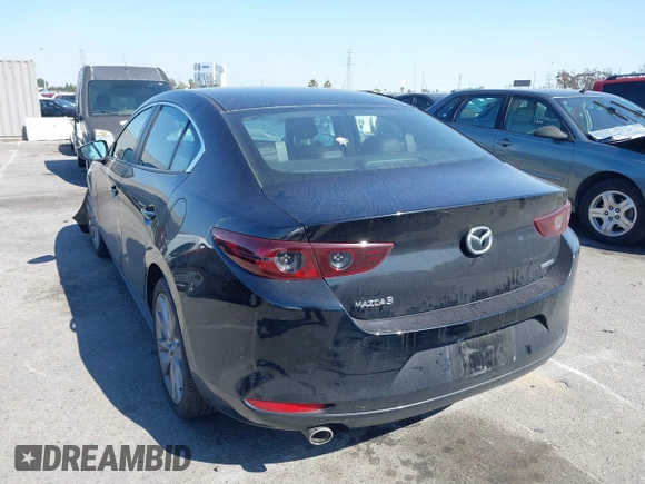 2021 Mazda 3 Select with VIN 3MZBPABL2MM250695, listed as a IAAI auction lot 42001485 with 29,672 mi miles and . Bid and sale history available at DreamBid. Image 3.