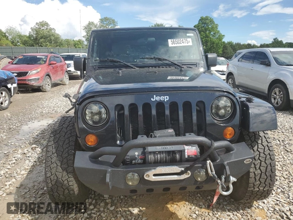 2007 Jeep Wrangler Sahara z VIN 1J8FA54137L209032, wystawiony jako Copart lot #56502475 z przebiegiem 129 402 mil mil oraz Szkoda całkowita • Salvage title. Historia ofert i sprzedaży dostępna na DreamBid. Obrazek 5.