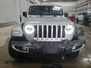 2021 Jeep Wrangler Unlimited Sahara with VIN 1C4JJXP65MW682462, listed as a Copart auction lot 58673385 with 38,714 mi miles and Salvage title. Bid and sale history available at DreamBid. Image 5.