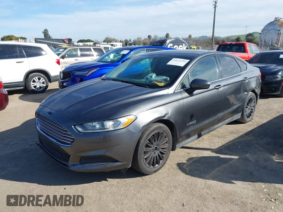 2015 Ford Fusion S Hybrid with VIN 3FA6P0UU2FR105754, listed as a IAAI auction lot 41631104 with 185,114 mi miles. Bid and sale history available at carsss.com. Image 2.