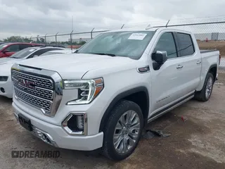2022 GMC Sierra 1500 Denali with VIN 3GTU9FELXNG127029, listed as a IAAI auction lot 42062882 with 24,082 mi miles and . Bid and sale history available at DreamBid. Image 6.