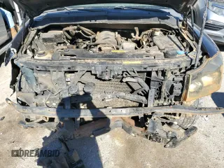 2007 Nissan Titan XE with VIN 1N6BA07A47N245317, listed as a Copart auction lot 82702474 with 230,066 mi miles and Salvage Title. Bid and sale history available at DreamBid. Image 11.