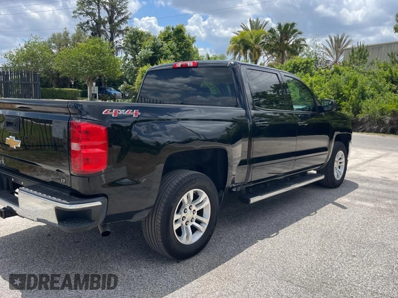2017 Chevrolet Silverado 1500 LT with VIN 3GCUKREC9HG516786, listed as a Copart auction lot 55291505 with 110,643 mi miles and Clean Title. Bid and sale history available at DreamBid. Image 4.