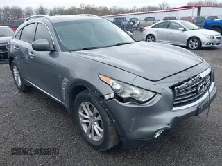 2016 Infiniti QX70 z VIN JN8CS1MW0GM400207, wystawiony jako IAAI lot #41952548 z przebiegiem 146 943 mil mil oraz . Historia ofert i sprzedaży dostępna na DreamBid. Obrazek 1.