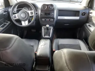 2014 Jeep Compass High Altitude with VIN 1C4NJCEA9ED678722, listed as a Copart auction lot 86573694 with 234,985 mi miles and Clean Title. Bid and sale history available at carsss.com. Image 8.