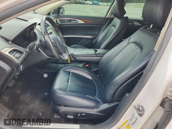 2016 Lincoln MKZ z VIN 3LN6L2G90GR616997, wystawiony jako Copart lot #62917525 z przebiegiem 194 744 mil mil oraz Szkoda całkowita • Salvage title. Historia ofert i sprzedaży dostępna na DreamBid. Obrazek 7.