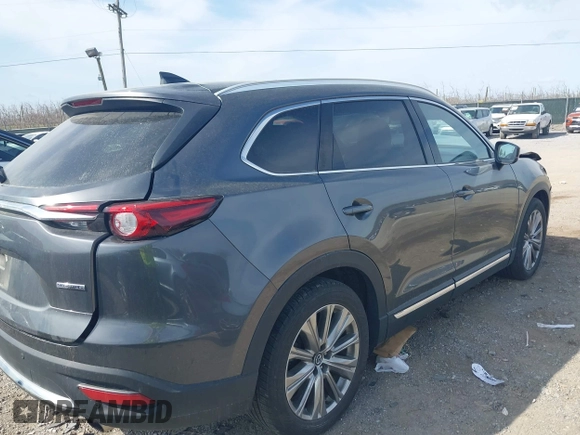 2021 Mazda CX-9 Signature with VIN JM3TCBEY5M0523199, listed as a IAAI auction lot 41916480 with 56,772 mi miles. Bid and sale history available at carsss.com. Image 4.