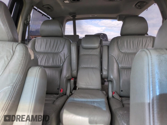 2005 Honda Odyssey Touring z VIN 5FNRL38855B051447, wystawiony jako Copart lot #57144925 z przebiegiem 186 476 mil mil oraz Szkoda całkowita • Salvage title. Historia ofert i sprzedaży dostępna na DreamBid. Obrazek 10.