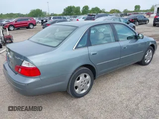 2004 Toyota Avalon XL with VIN 4T1BF28B04U370884, listed as a IAAI auction lot 42207912 with 210,339 mi miles and . Bid and sale history available at DreamBid. Image 4.