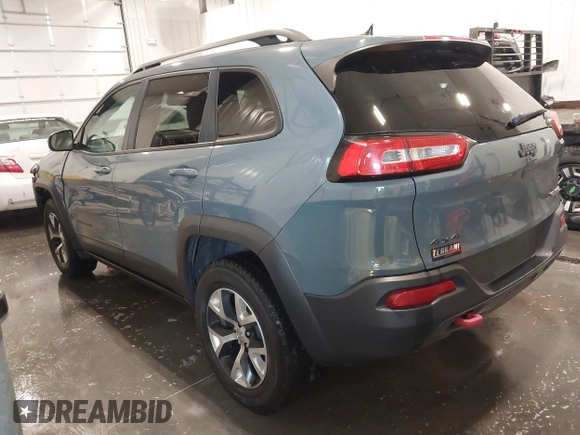 2015 Jeep Cherokee Trailhawk with VIN 1C4PJMBB4FW528633, listed as a IAAI auction lot 42147632 with 166,669 mi miles and . Bid and sale history available at DreamBid. Image 3.