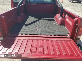 1989 Dodge Dakota z VIN 1B7GG66X6KS127702, wystawiony jako Copart lot #43276685 z przebiegiem 121 862 mil mil oraz Czysty tytuł • Clean title. Historia ofert i sprzedaży dostępna na DreamBid. Obrazek 10.
