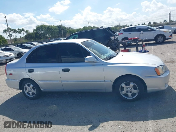2002 Hyundai Accent GL with VIN KMHCG45C82U268756, listed as a IAAI auction lot 41569829 with 89,752 mi miles. Bid and sale history available at carsss.com. Image 13.