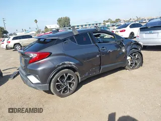 2019 Toyota C-HR XLE with VIN JTNKHMBX3K1018567, listed as a IAAI auction lot 41602932 with 213,386 mi miles and . Bid and sale history available at DreamBid. Image 4.